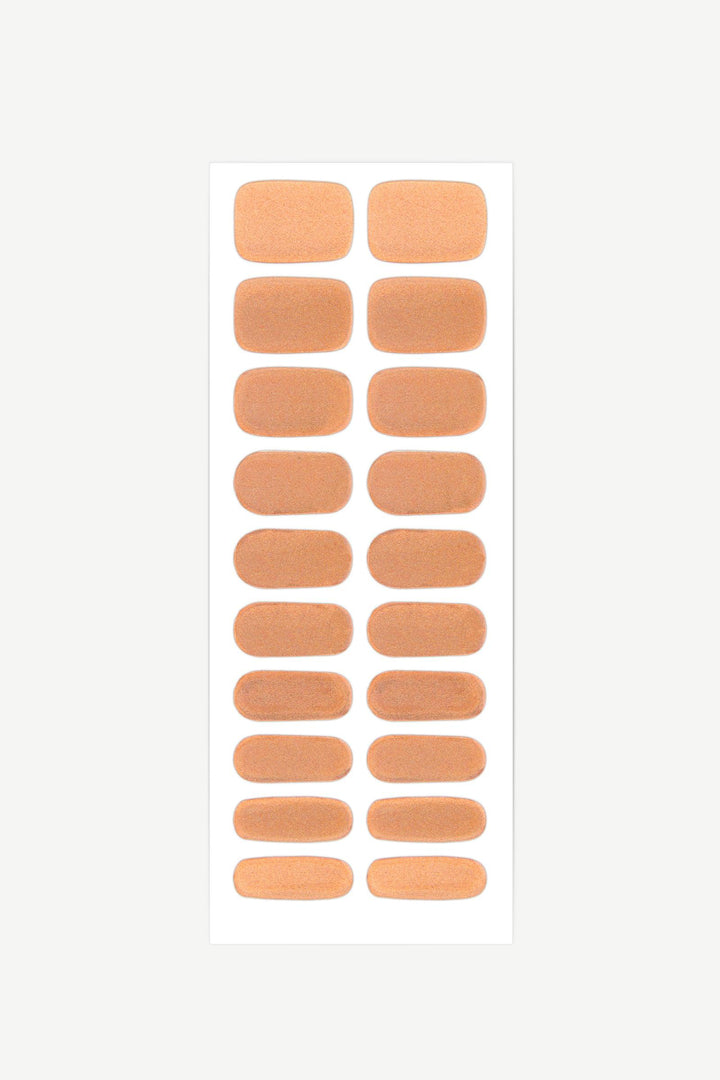 Sheet of copper shimmer gel nail wraps with metallic high-gloss finish and fully opaque coverage.