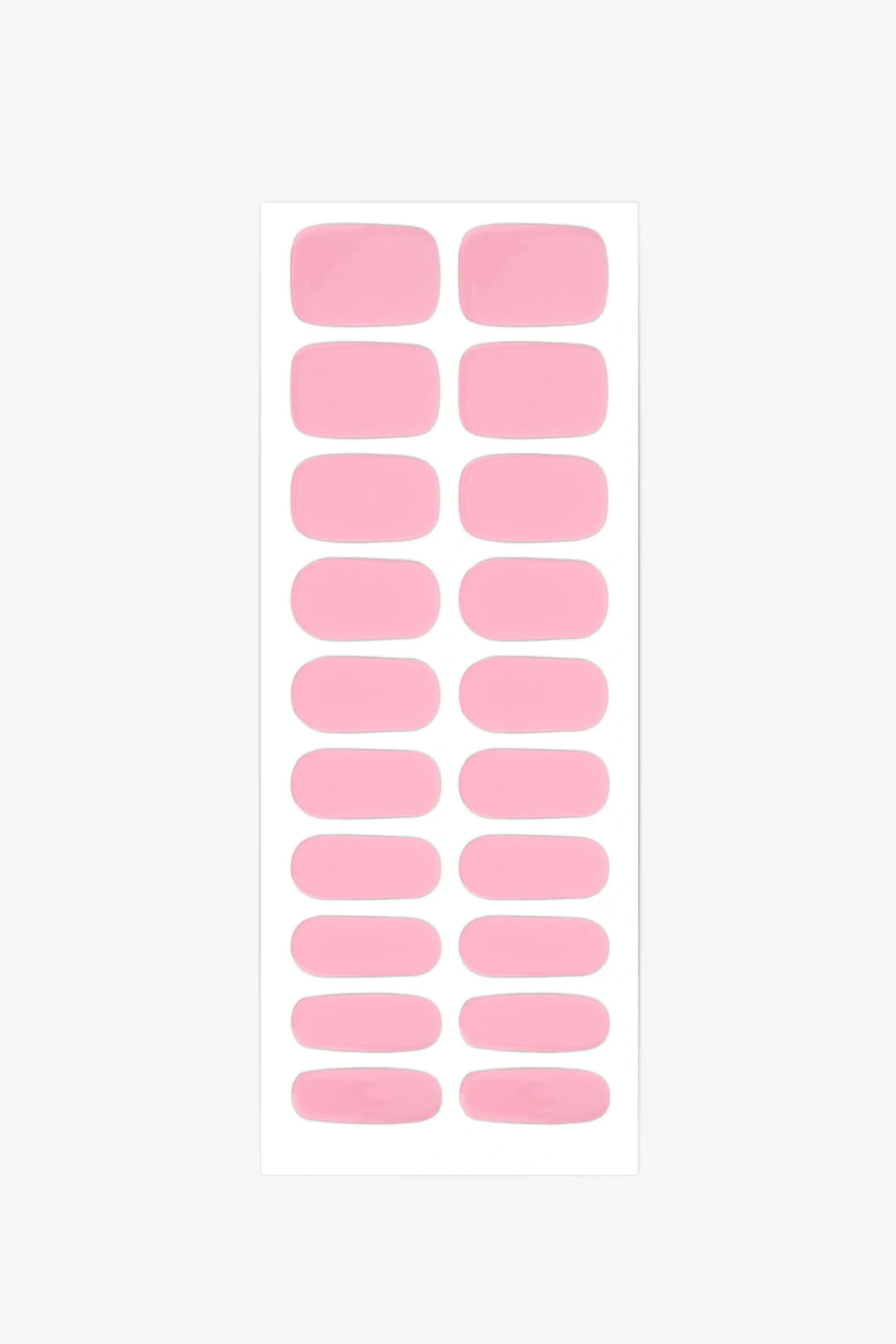 Sheet of semi-cured gel nail wraps in vibrant Barbiecore pink tones with a smooth, glossy surface.