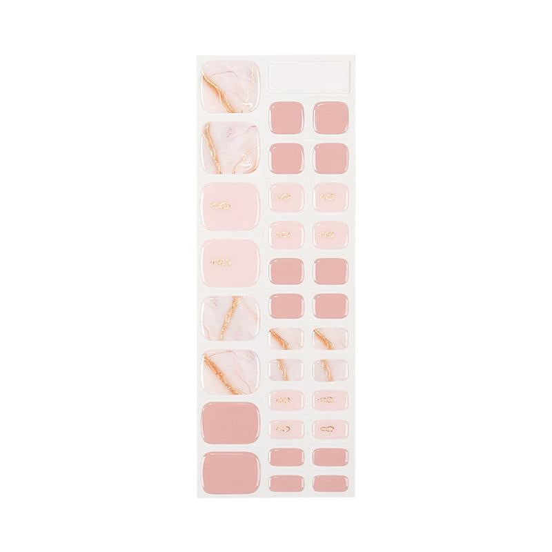 Sheet of blush pink semi-cured gel toenail strips with marble and gold accents in glossy finish, displayed on white background.