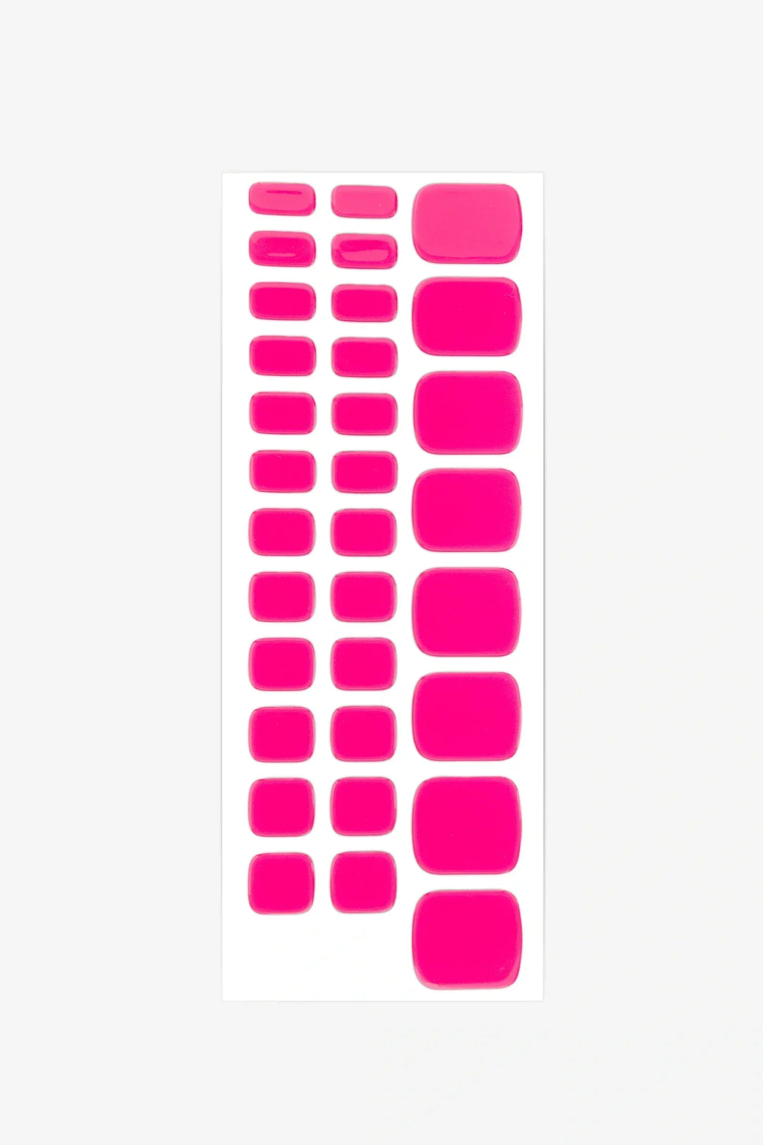 Sheet of bright pink gel toenail stickers in multiple sizes on a white backing.