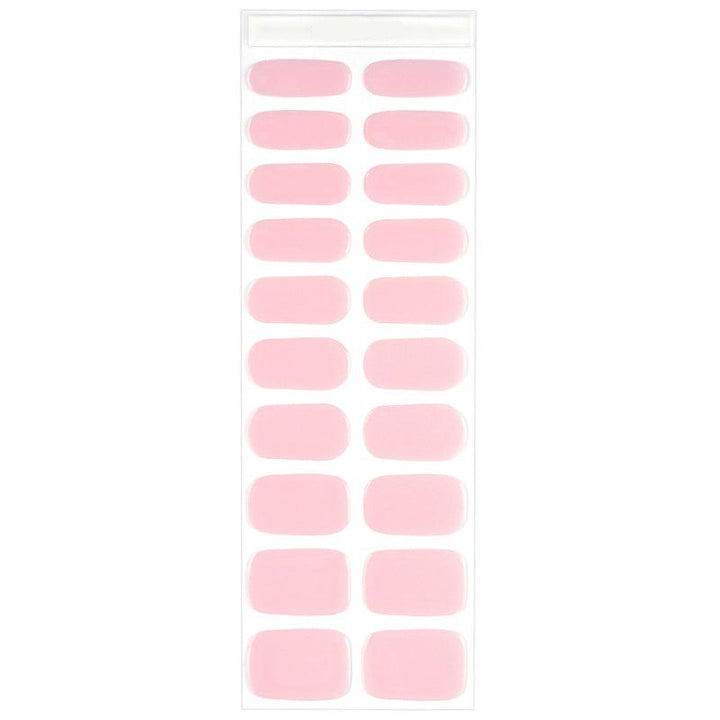 Sheet of semi-sheer candyfloss pink gel nail strips with glossy finish.