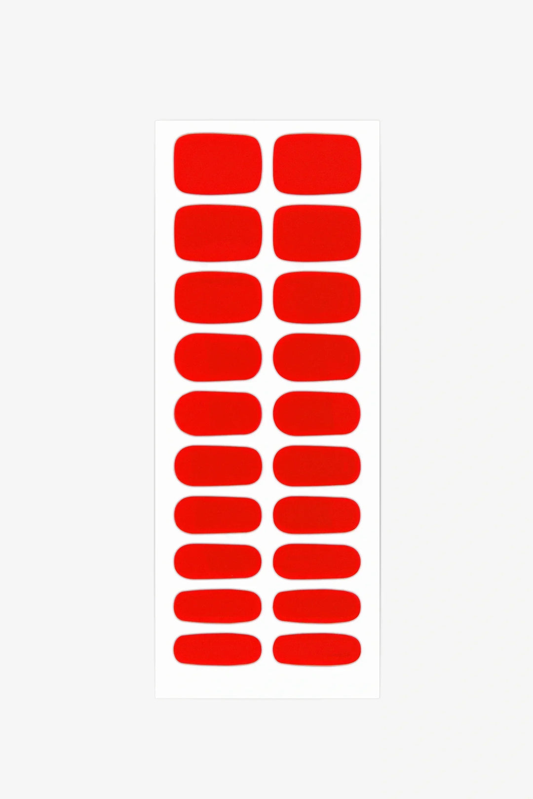 Sheet of crimson red glossy semi-cured gel nail stickers.