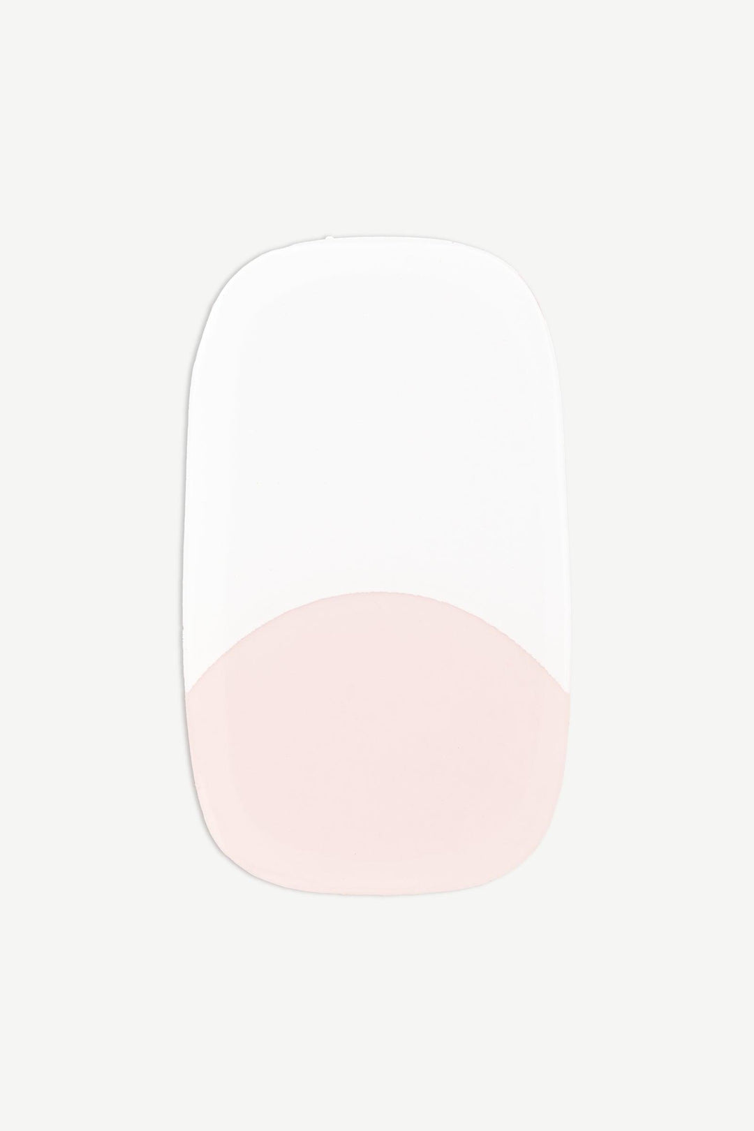 A macro image of a single French tip stick-on gel nail with nude base and clean white edge, shown on white background.
