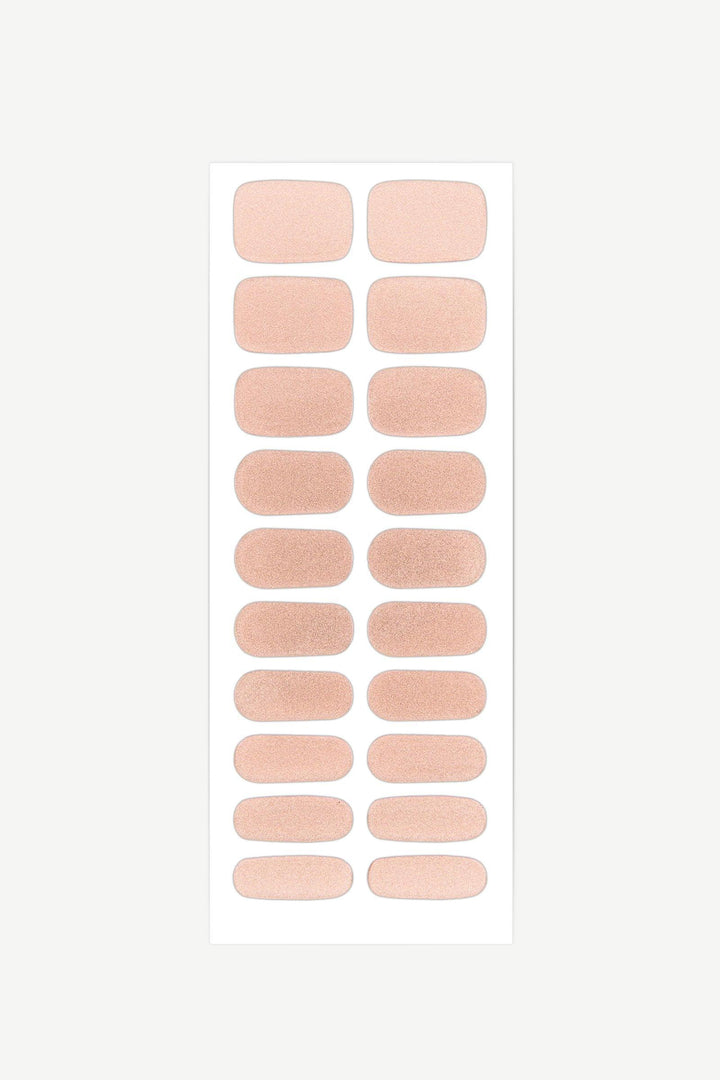 Sheet of champagne gold semi-cured gel nail wraps with fine shimmer and smooth glossy finish