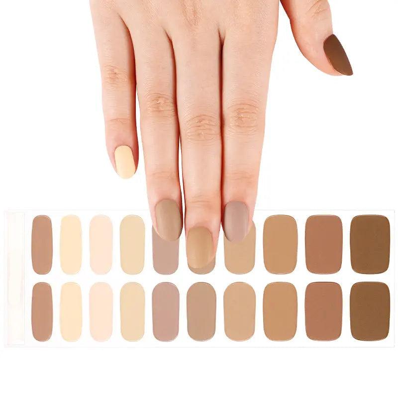 Sheet of neutral matte gel nail wraps featuring gradient tones from beige to brown with smooth velvety finish.