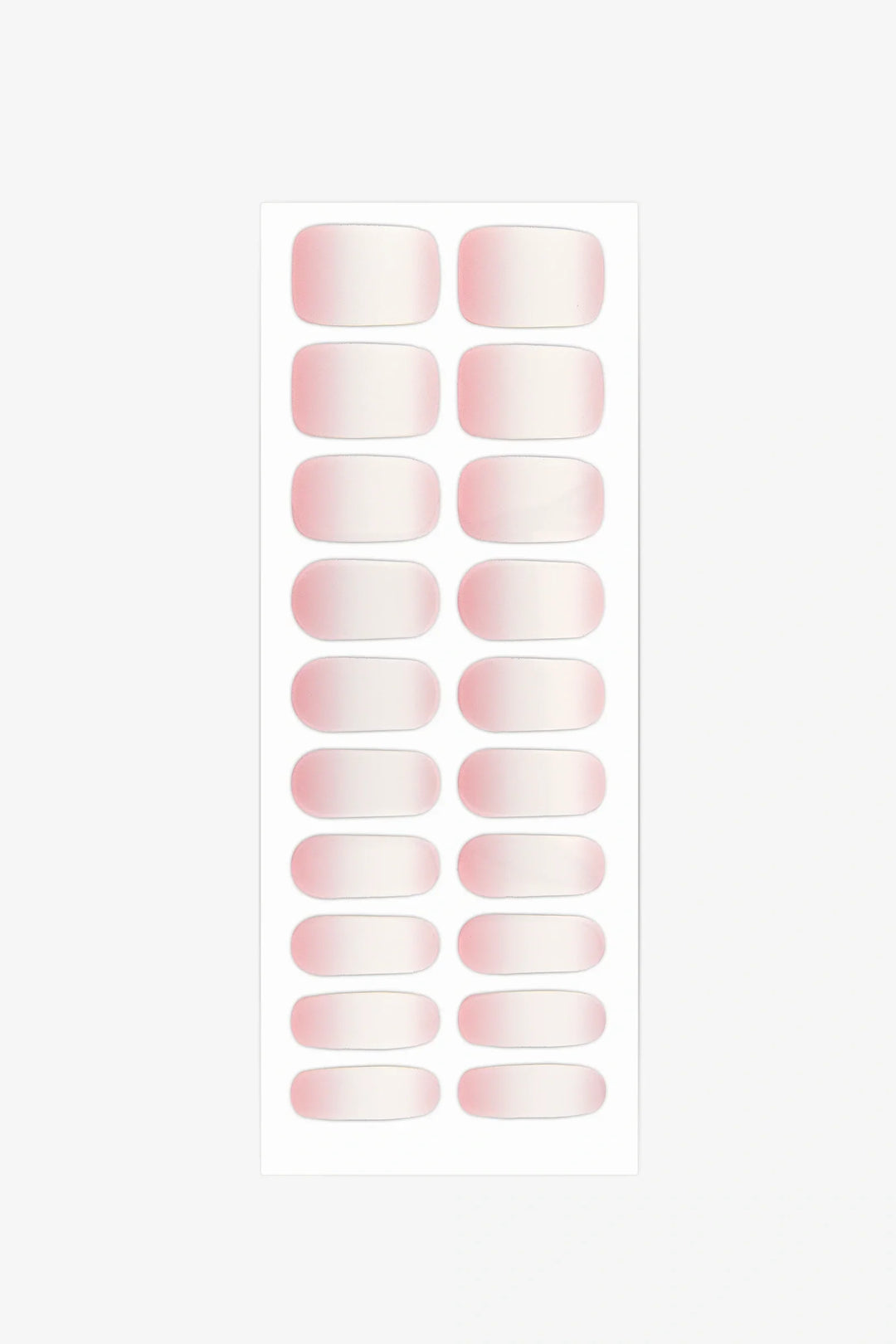 Full sheet of Baby Boomer gel nail wraps in a milky white to blush pink gradient, displayed in various sizes on a white background.