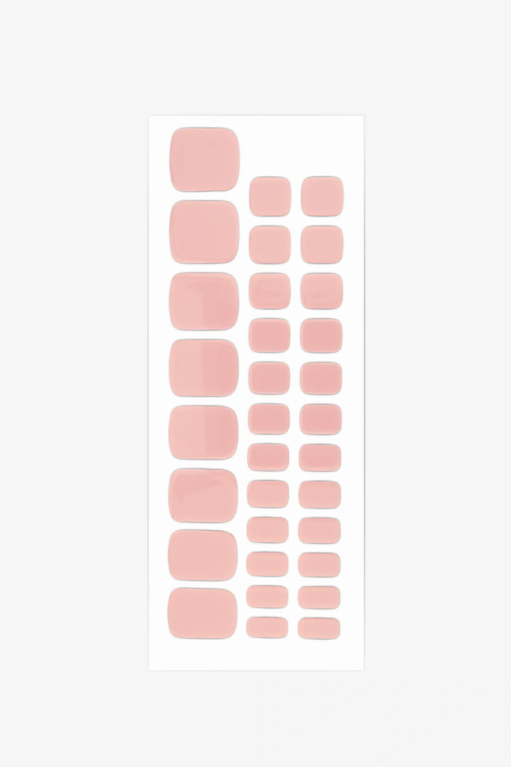 Full sheet of Barefoot gel toenail strips in a light peach nude shade, displayed in various sizes on a white background.