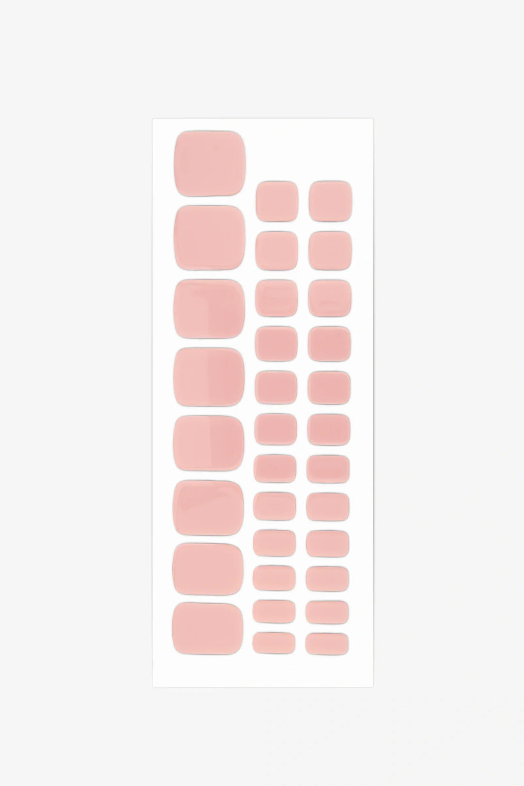 Full sheet of Barefoot gel toenail strips in a light peach nude shade, displayed in various sizes on a white background.