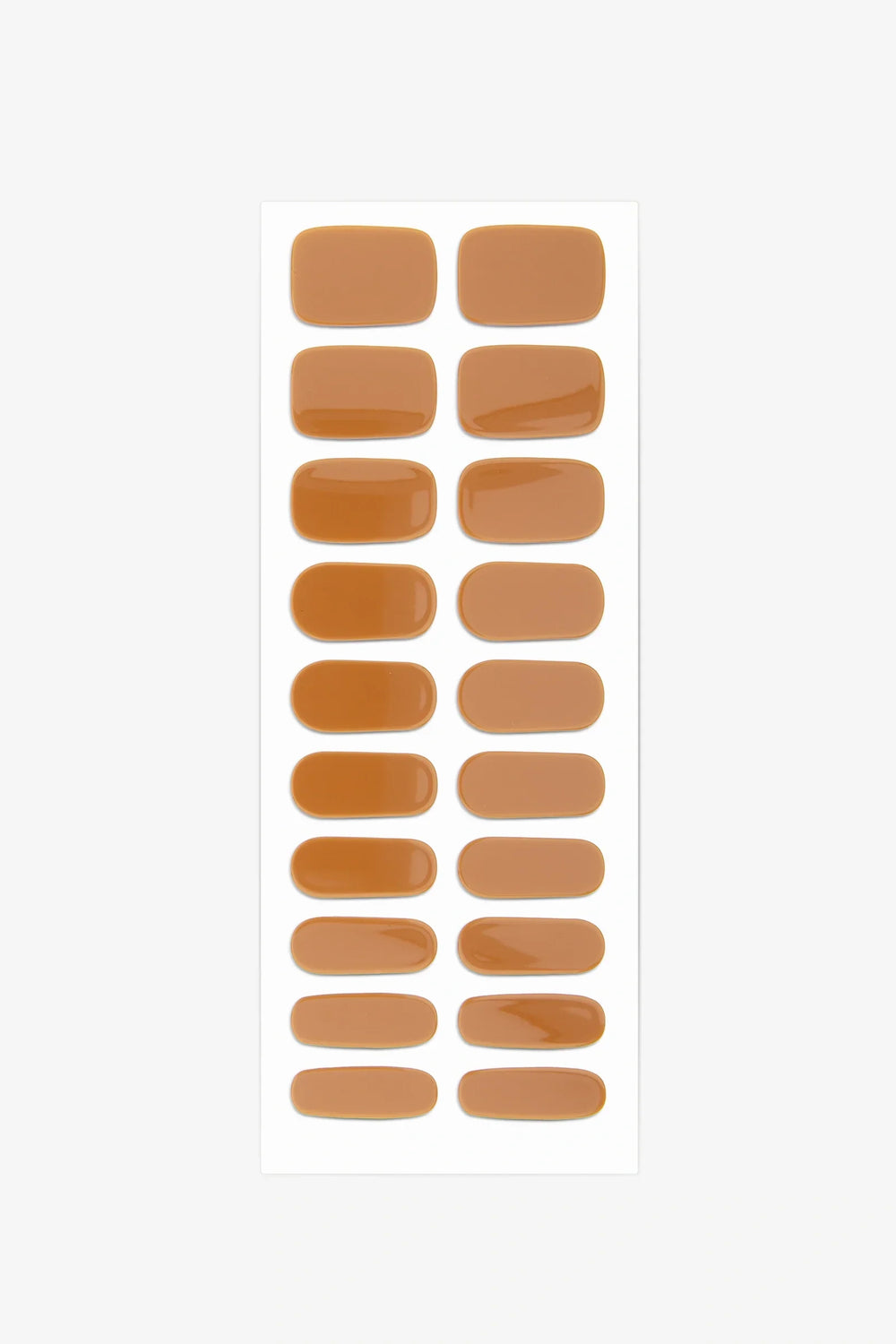 Full sheet of Burnt Caramel semi-cured gel nail stickers displaying various sizes on a white background.