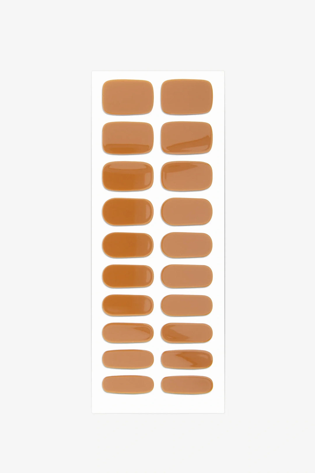 Full sheet of Burnt Caramel semi-cured gel nail stickers displaying various sizes on a white background.