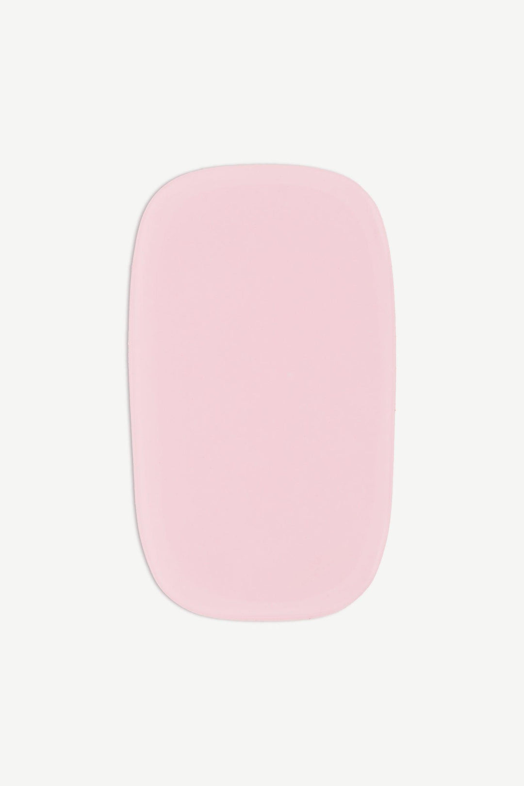 A close-up image of a single candyfloss pink stick-on gel nail with translucent finish and smooth glossy surface on white background.
