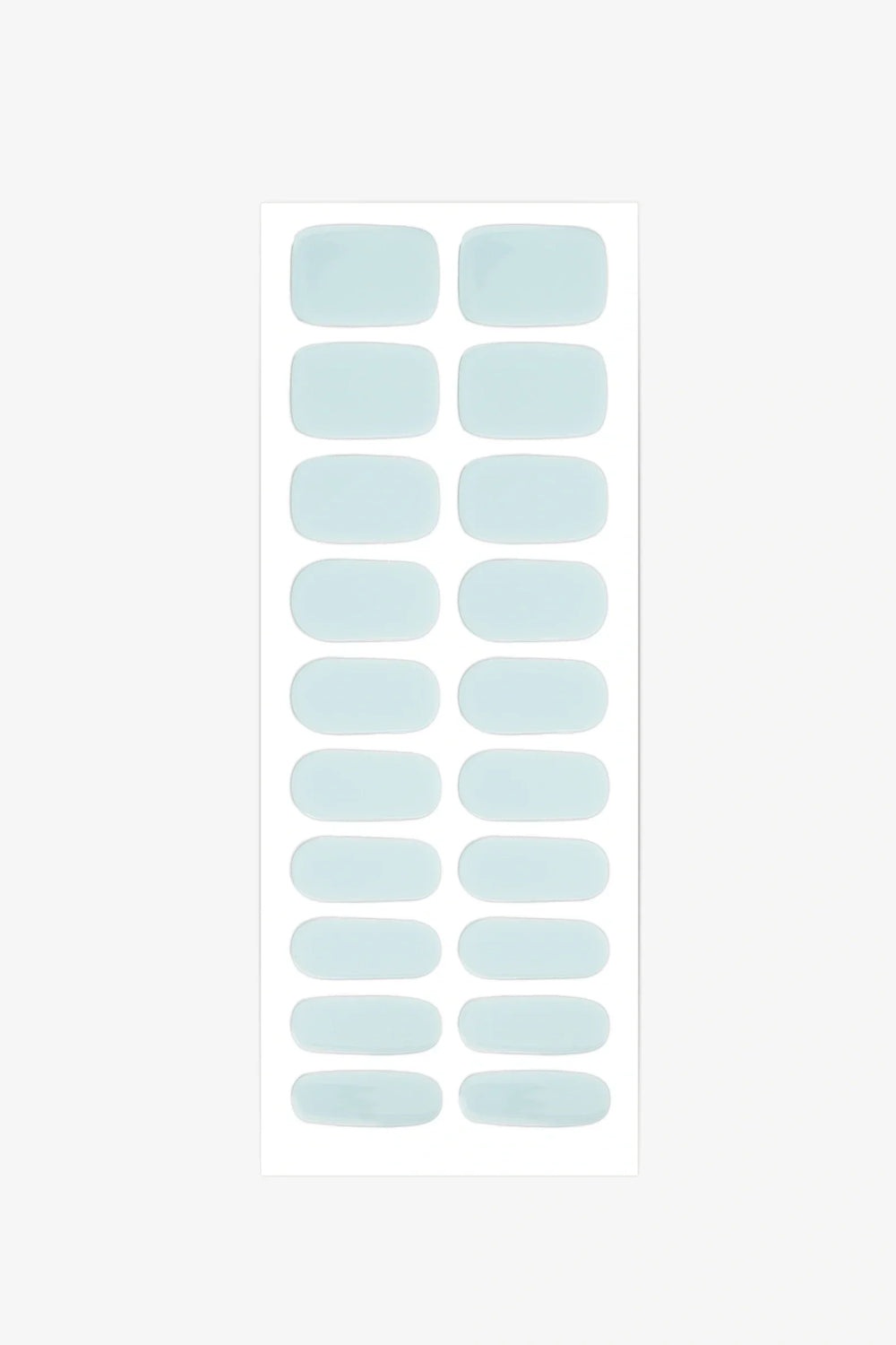 Sheet of semi-cured gel nail wraps in pale sea-foam teal shades with a smooth, high-gloss surface