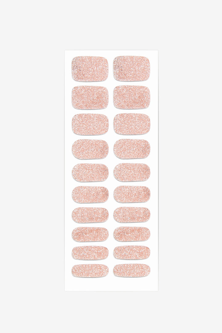 Full sheet of Champagne Sparkle semi-cured gel nail stickers displaying various sizes on a white background.