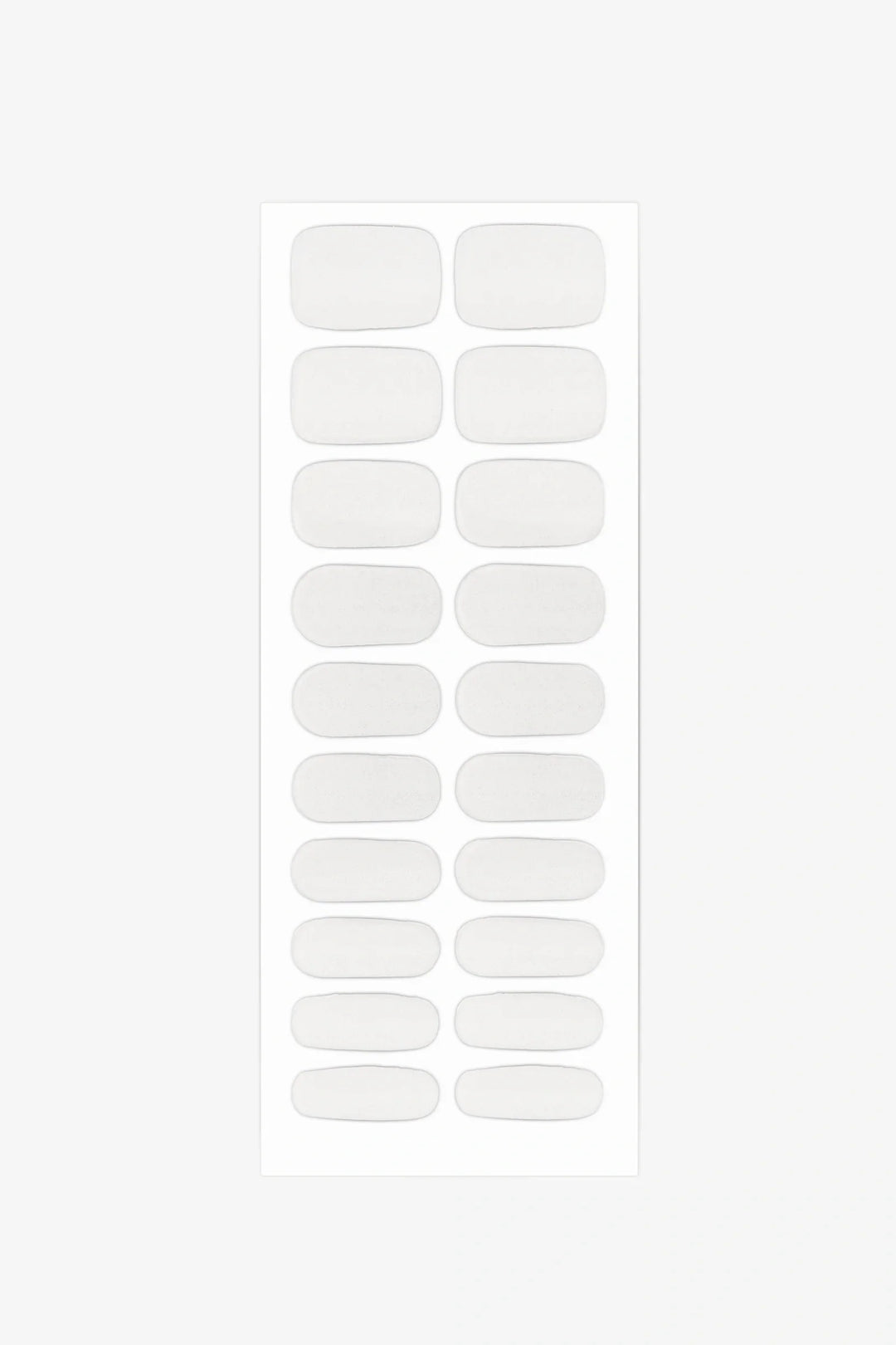 Full sheet of Clear Cat Eye gel nail wraps in glossy transparent tones with subtle shimmer, displayed in various sizes on a white background.