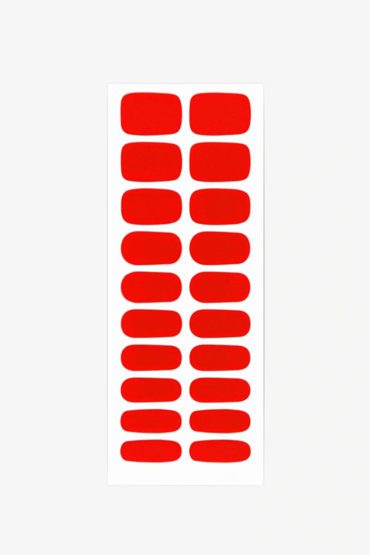 Sheet of crimson red glossy semi-cured gel nail stickers.