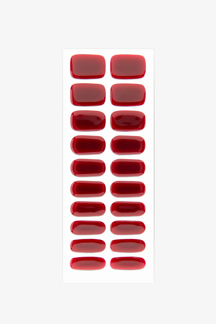 Full sheet of Dark Cherry Jam UV-free gel nail stickers displaying various sizes on a white background.