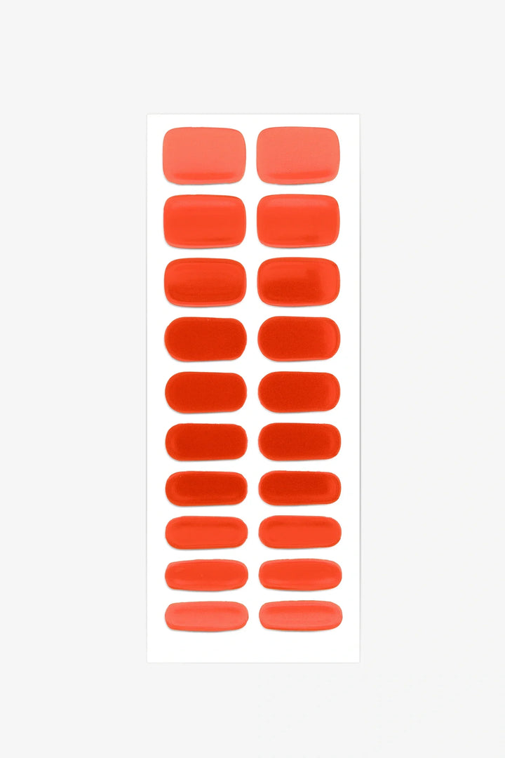 Full sheet of Fiery Red semi-cured gel nail stickers displaying various sizes on a white background.