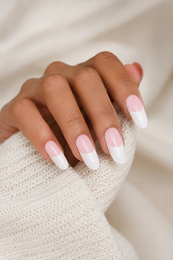 French Tips UV-free gel nail wraps featuring soft blush pink bases paired with crisp white tips and a glossy finish, shown on light skin.