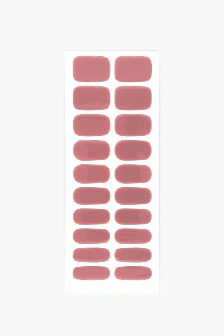 Sheet of light rose pink gel nail stickers with a smooth, glossy finish.