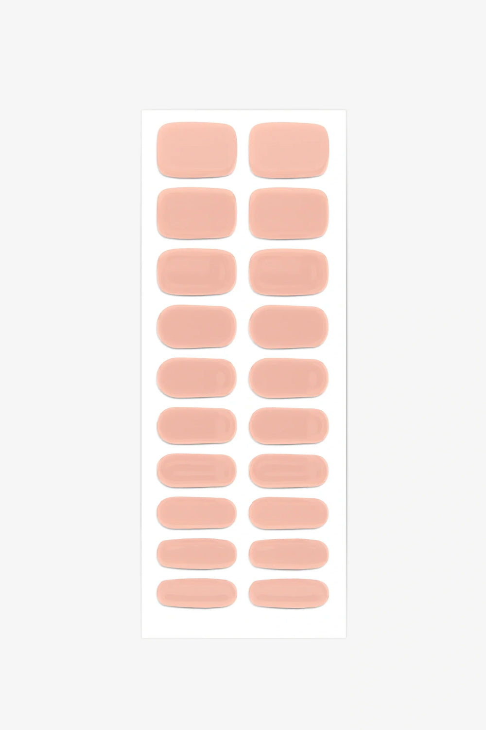 Full sheet of Nude Peach semi-cured gel nail stickers displaying various sizes on a white background.