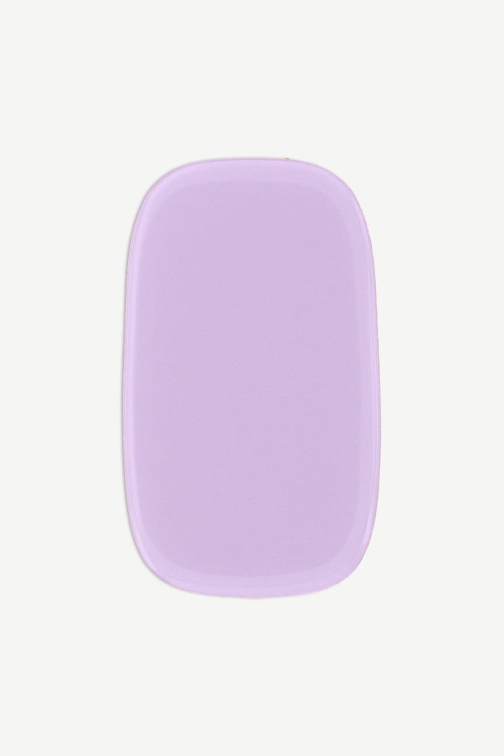 Close-up of a single pastel lavender stick-on gel nail wrap with a smooth, glossy finish on a white background.