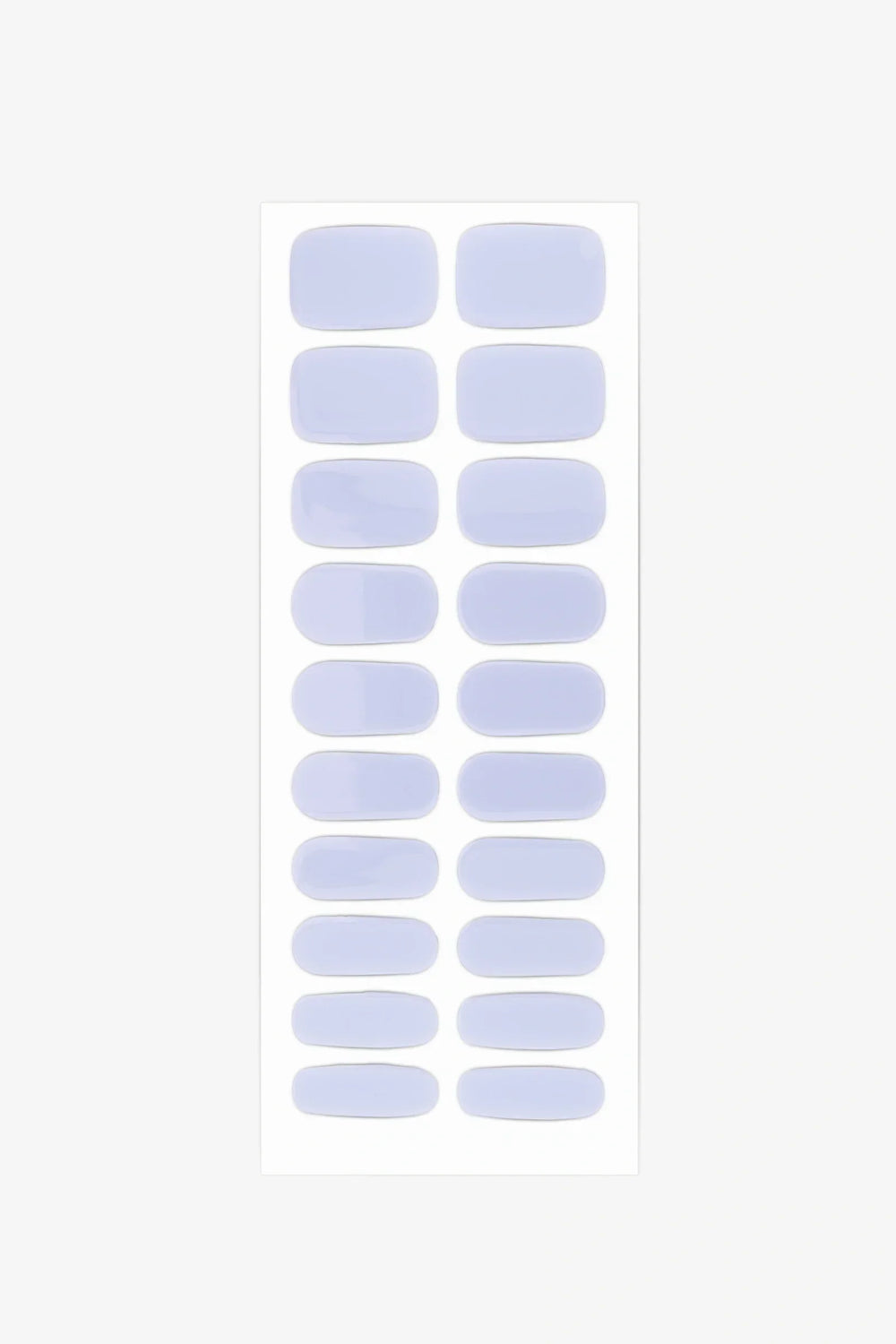 Sheet of semi-cured gel nail wraps in pale lavender-blue tones with a polished glossy surface.