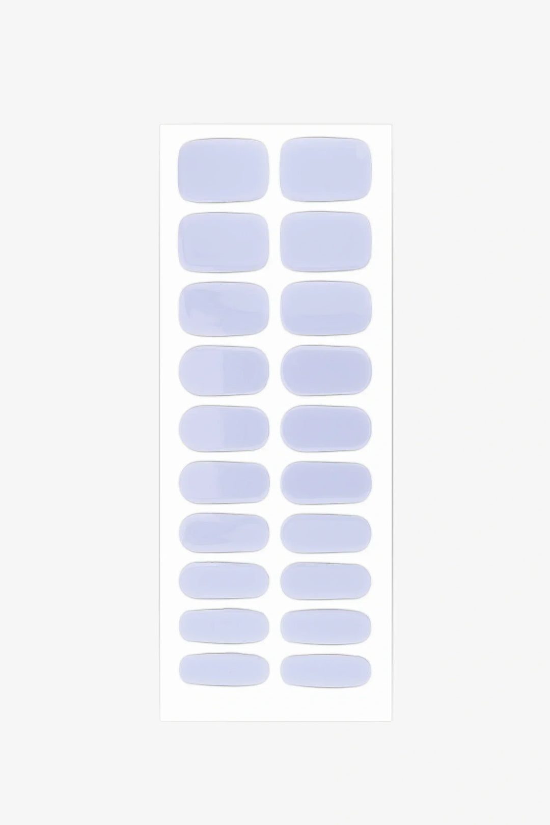 Sheet of semi-cured gel nail wraps in pale lavender-blue tones with a polished glossy surface.