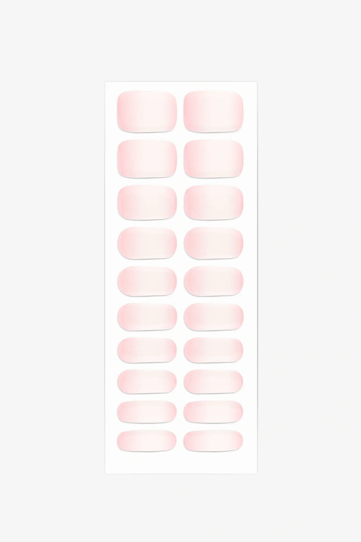 Full sheet of Pienk Melkie UV-free gel nail stickers displaying various sizes on a white background.
