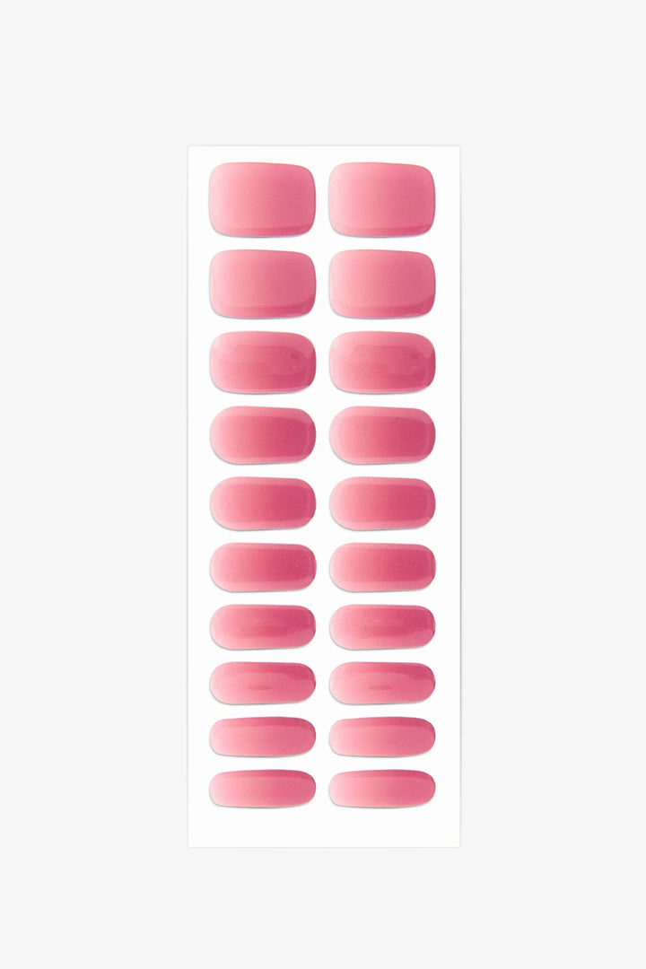 Full sheet of Pink Glow UV-free gel nail stickers displaying various sizes on a white background.