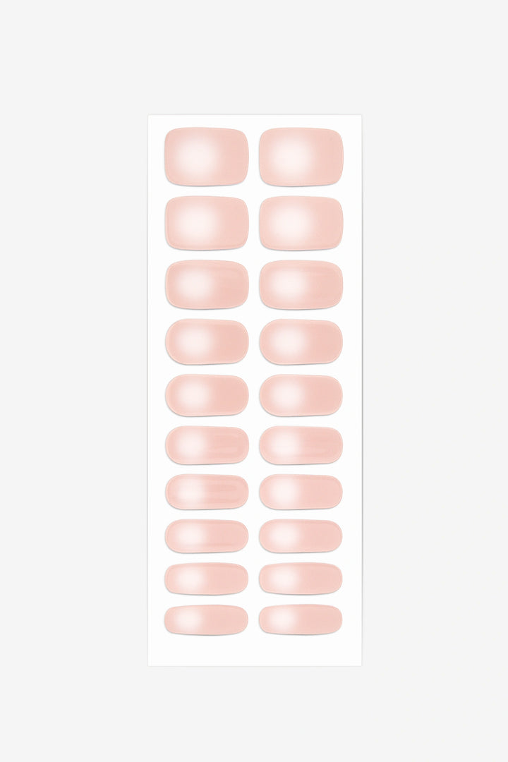Gelly Skin Tone Guide showing a full set of Pink Ombré semi-cured nail wraps across light-to-deep skin tone swatches, highlighting colour tone and opacity.
