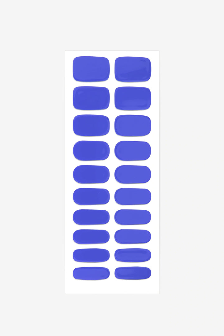 Full sheet of Royal Blue semi-cured gel nail stickers displaying various sizes on a white background.