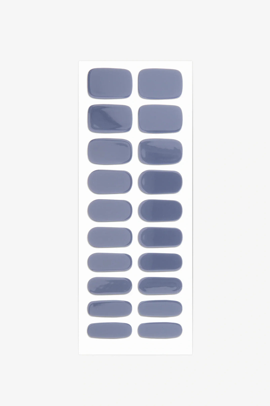 Full sheet of Slate Blue semi-cured gel nail stickers displaying various sizes on a white background.
