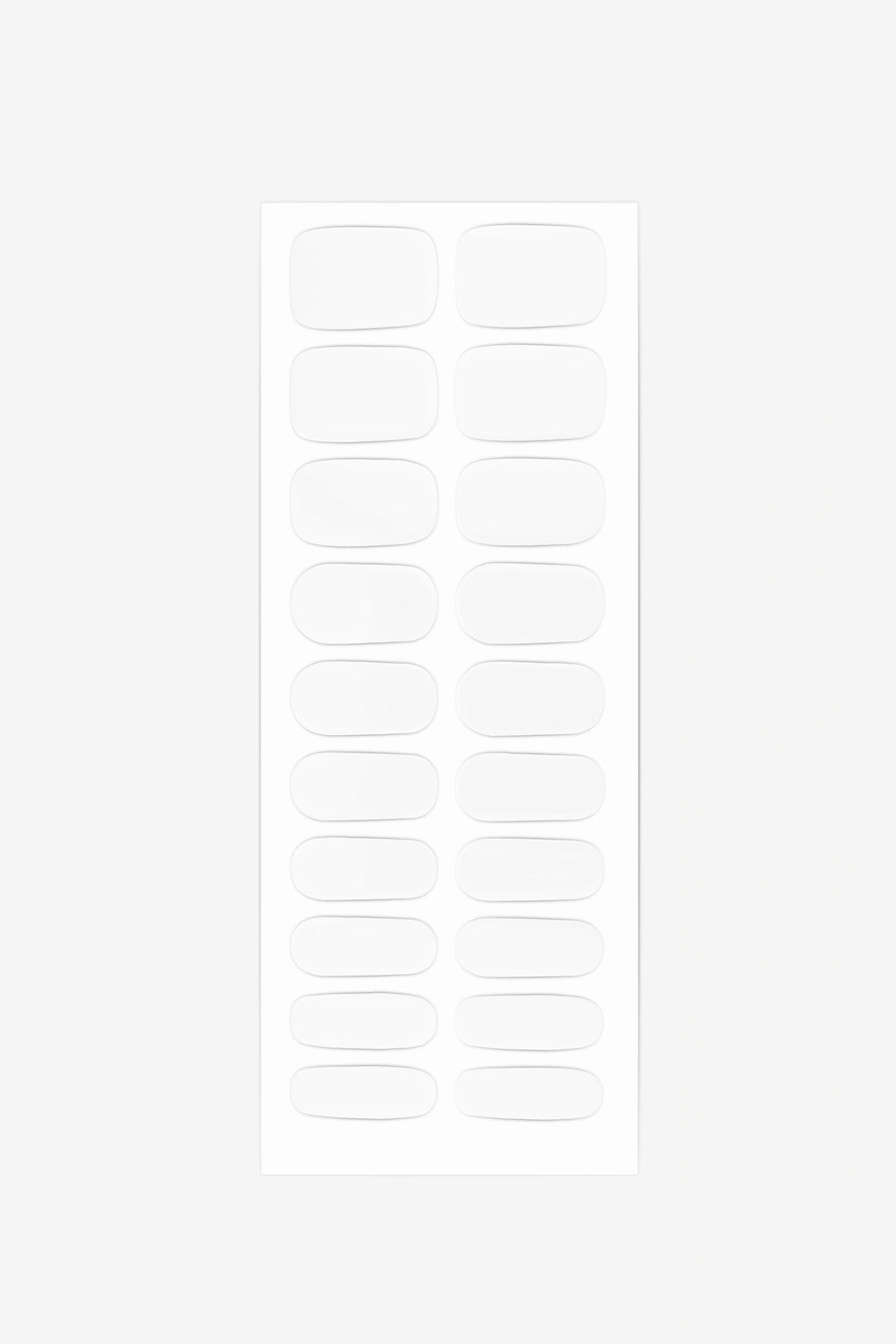 Sheet of pure white semi-cured gel nail wraps featuring a clean, glossy finish.