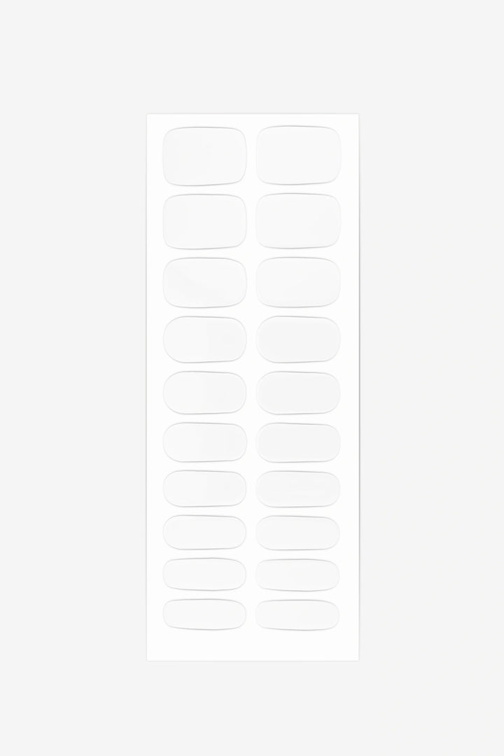 Sheet of pure white semi-cured gel nail wraps featuring a clean, glossy finish.