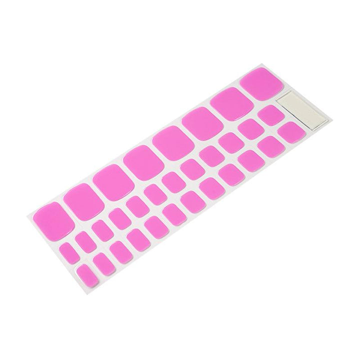 Sheet of pink bubblegum gel toenail stickers in various sizes, arranged on a white backing.