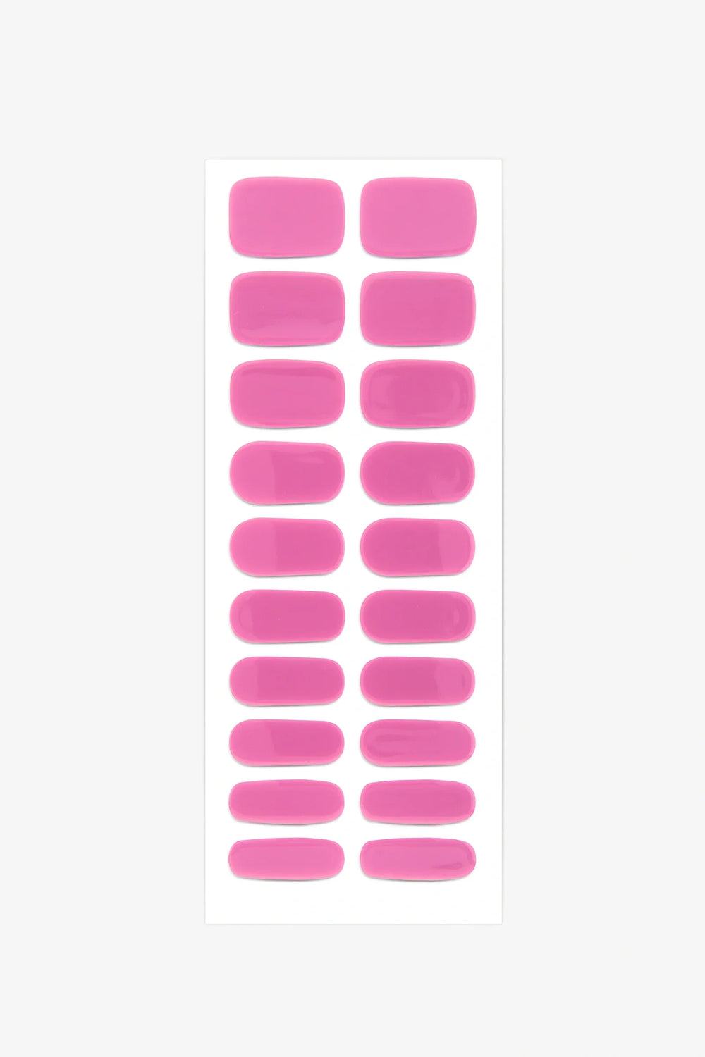 Full sheet of Translucent Pink Glow In The Dark semi-cured gel nail stickers displaying various sizes on a white background.