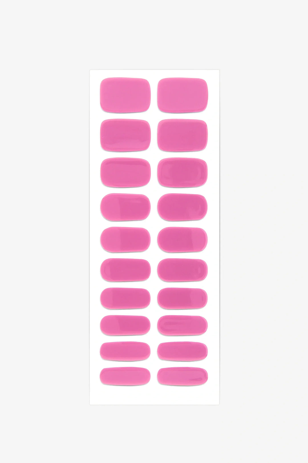 Full sheet of Translucent Pink Glow In The Dark semi-cured gel nail stickers displaying various sizes on a white background.
