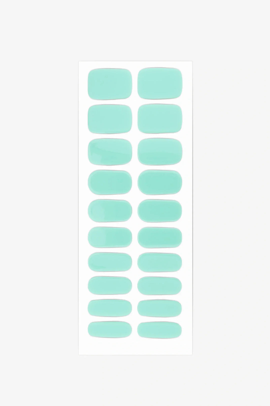Sheet of semi-cured gel nail wraps in bright turquoise aqua tones with a smooth, glossy surface.