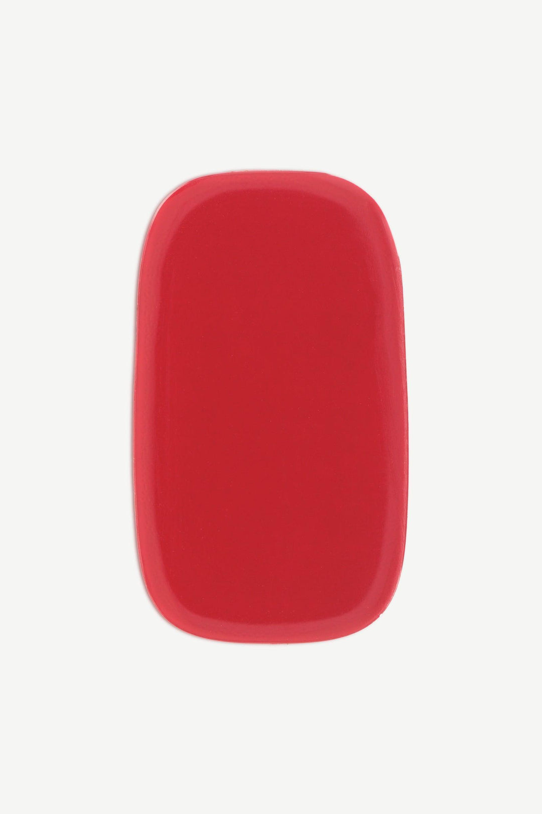 Close up of a wine red stick-on gel nail strip with opaque high-gloss finish, shown on white background.